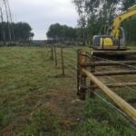 fence and excavator