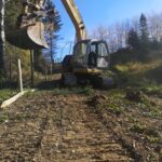 excavator with fence