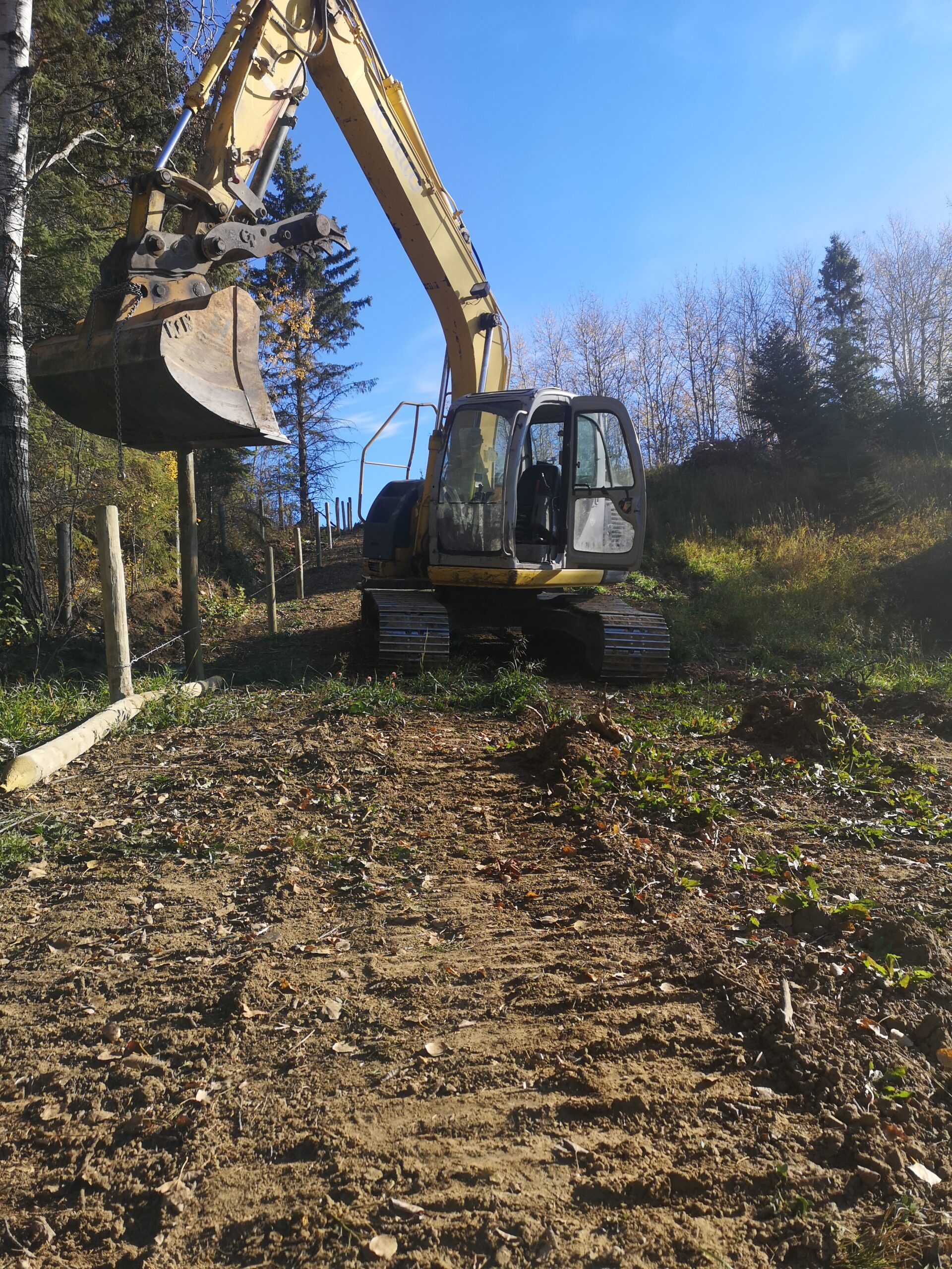 excavator with fence